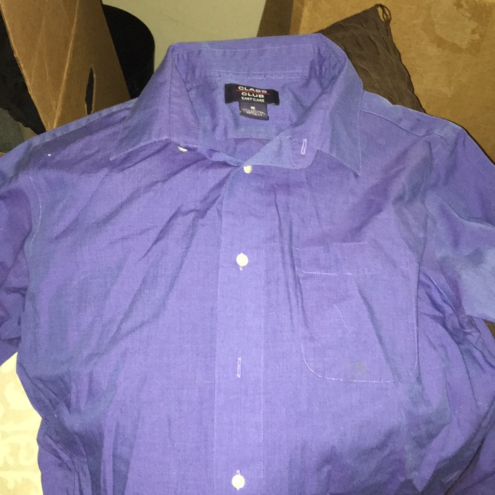 It’s blue it’s a boys shirt it’s from class club 60% cotton 40% polyester